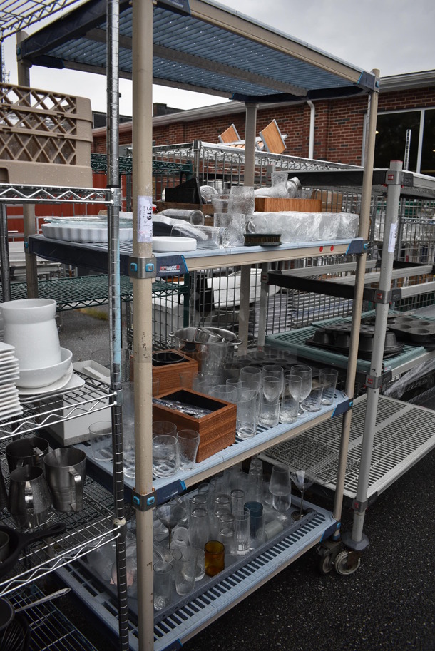 ALL ONE MONEY! Lot of 4 Tiers of Various Smallwares Including Glasses, Baking Pans. Does Not Include Shelving Unit