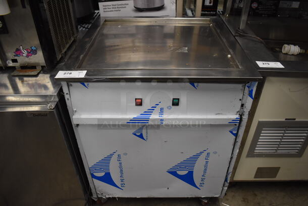 Stainless Steel Commercial Portable Rolled Ice Cream Frost Top Station on Commercial Casters. 28.5x28.5x35. Tested and Powers On But Does Not Get Cold