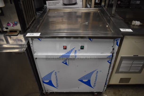 Stainless Steel Commercial Portable Rolled Ice Cream Frost Top Station on Commercial Casters. 28.5x28.5x35. Tested and Powers On But Does Not Get Cold - Image 1 of 4