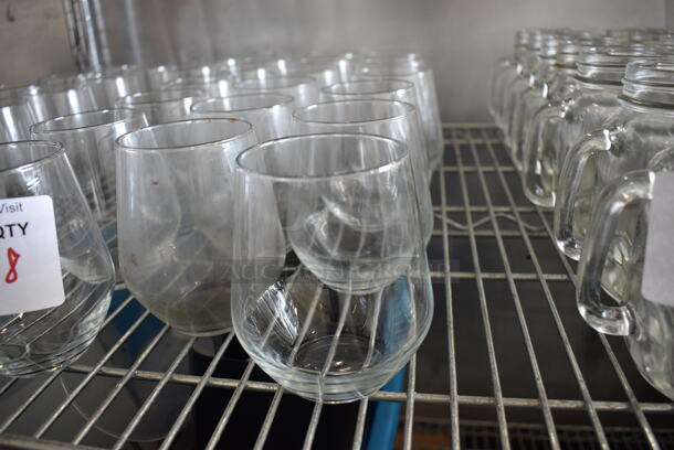 18 Beverage Glasses. 3x3x4.5. 18 Times Your Bid!