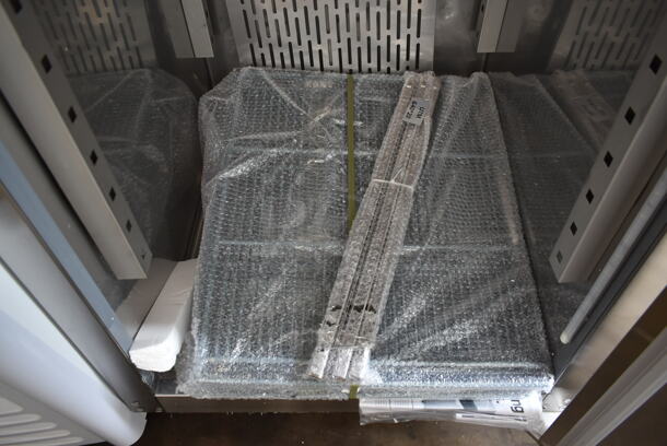 BRAND NEW SCRATCH AND DENT! 2023 Avantco 178Z1FHC Stainless Steel Commercial Single Door Reach In Freezer w/ Poly Coated Racks on Commercial Casters. 115 Volts, 1 Phase. Tested and Working! - Image 7 of 7