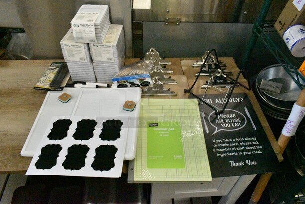 ALL ONE MONEY! Lot of Various Items Including Clipboards, Guest Checks, Counterfeit Money Pens.  - Image 1 of 11