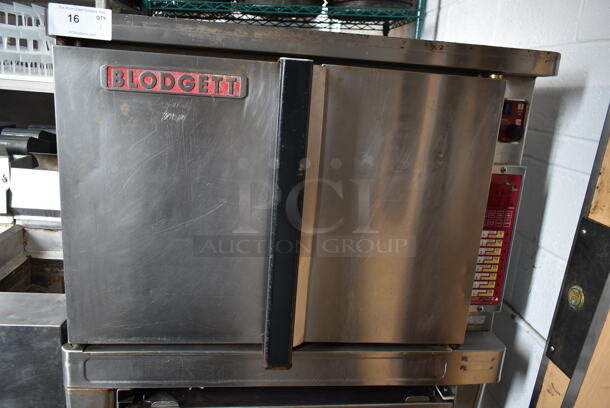 Blodgett Stainless Steel Commercial Electric Powered Full Size Convection Oven w/ Solid Doors, Metal Oven Racks and Metal Legs on Commercial Casters. 208-240 Volts, 3 Phase. - Image 2 of 5