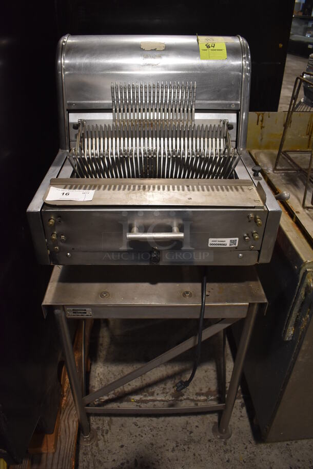 Berkel Metal Commercial Countertop Bread Loaf Slicer on Berkel 10S Metal Stand. 115 Volts, 1 Phase. 23.5x25x50.5. Tested and Does Not Power On