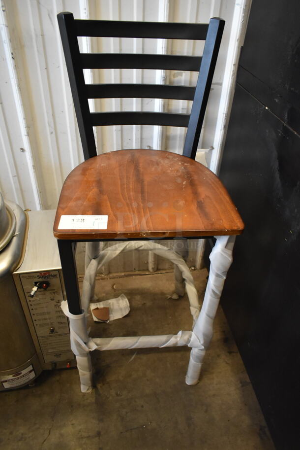 BRAND NEW SCRATCH AND DENT! Black Metal Bar Height Chair w/ Ladder Back and Wooden Seat. - Item #1112386