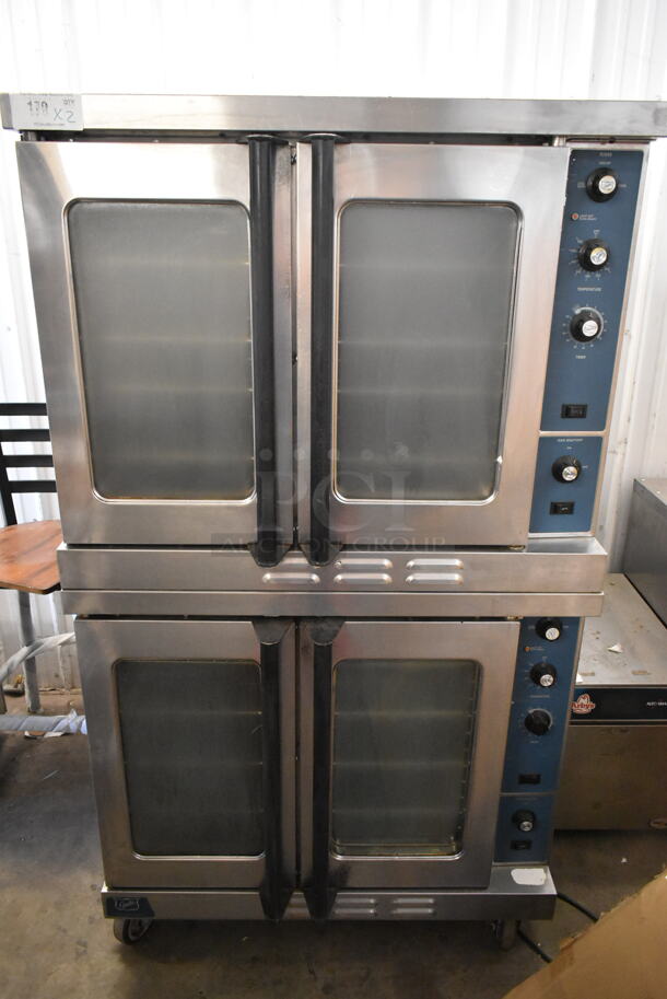 2 Duke Stainless Steel Commercial Natural Gas Powered Full Size Convection Oven w/ View Through Doors, Metal Oven Racks and Thermostatic Controls on Commercial Casters. 2 Times Your Bid!