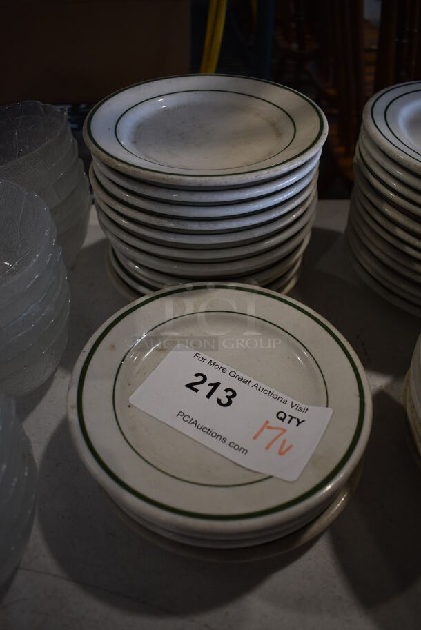 17 White Ceramic Plates w/ Green Lines on Rim. 6.5x6.5x1. 17 Times Your Bid!