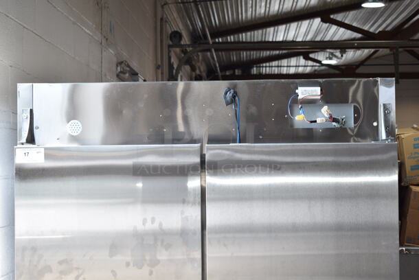 BRAND NEW SCRATCH AND DENT! 2024 Avantco 178A49FHC Stainless Steel Commercial 2 Door Reach In Freezer w/ Poly Coated Racks on Commercial Casters. 115 Volts, 1 Phase. Cannot Test - Interior Pieces are Detached - Image 4 of 9