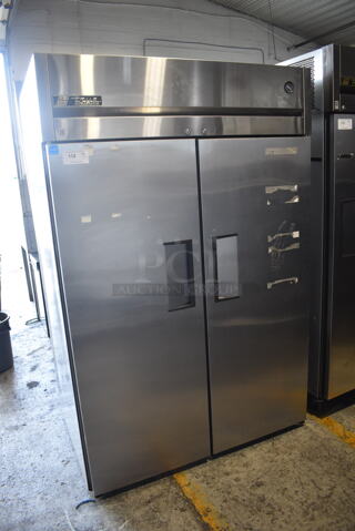 True TG2R-2S Commercial Stainless Steel Reach In Two-Section Cooler With Polycoated Racks on Commercial Casters. 115V/1 Phase. Tested And Working