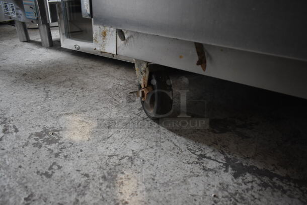 Traulsen G20010 Stainless Steel Commercial 2 Door Reach In Cooler w/ Poly Coated Racks on Commercial Casters. 115 Volts, 1 Phase.  Tested and Powers On But Does Not Get Cold - Image 4 of 7
