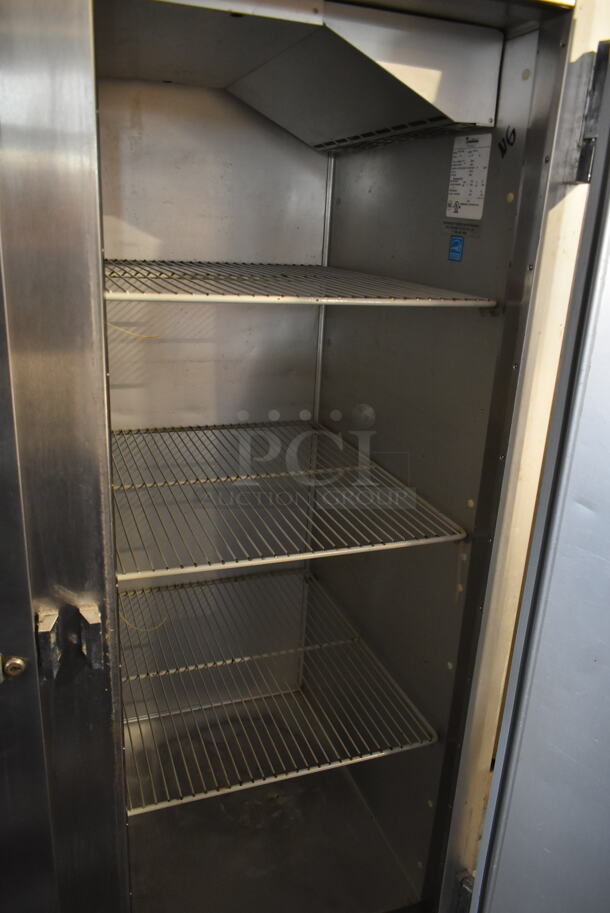 Traulsen G20010 Stainless Steel Commercial 2 Door Reach In Cooler w/ Poly Coated Racks on Commercial Casters. 115 Volts, 1 Phase.  Tested and Powers On But Does Not Get Cold - Image 6 of 7