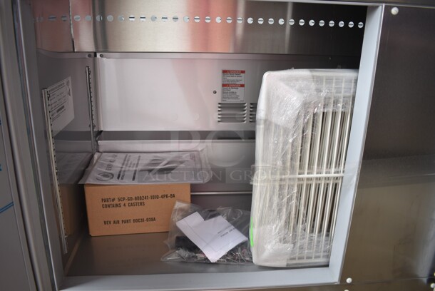 BRAND NEW SCRATCH AND DENT! Beverage Air SPE60HC-10 Stainless Steel Commercial Elite Series 60" 2 Door Refrigerated Sandwich Prep Table on Commercial Casters. 115 Volts, 1 Phase. Tested and Working! - Image 9 of 12