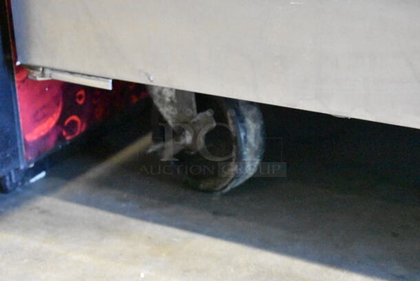 Delfield 6051-S Stainless Steel Commercial 2 Door Reach In Cooler w/ Poly Coated Racks on Commercial Casters. 115 Volts, 1 Phase. Tested and Working! - Image 4 of 10