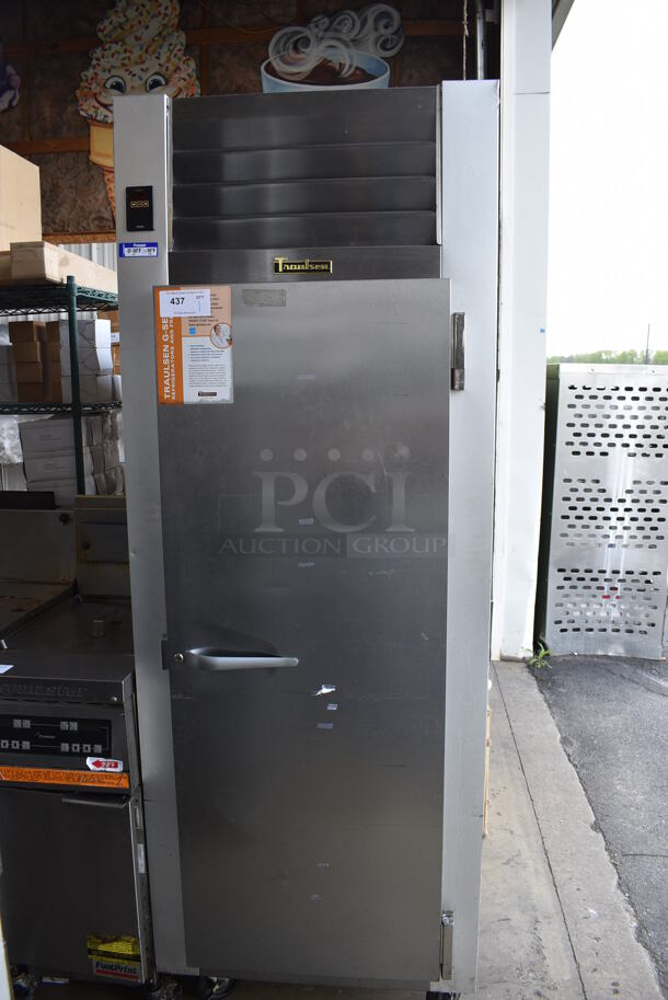Traulsen Model G12010 ENERGY STAR Stainless Steel Commercial Single Door Reach In Freezer w/ Poly Coated Racks on Commercial Casters. 115 Volts, 1 Phase. 30x36x83.5. Tested and Working!