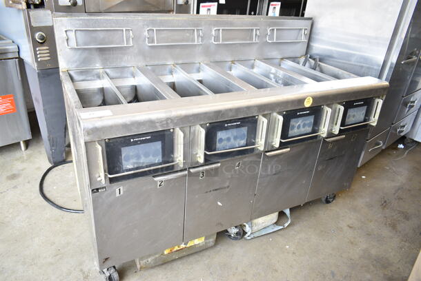 2019 Frymaster BIGLA430-8TSD Stainless Steel Commercial Natural Gas Powered 4 Bay Deep Fat Fryer w/ Filtration System on Commercial Casters. 105,000 BTU.  - Image 1 of 12