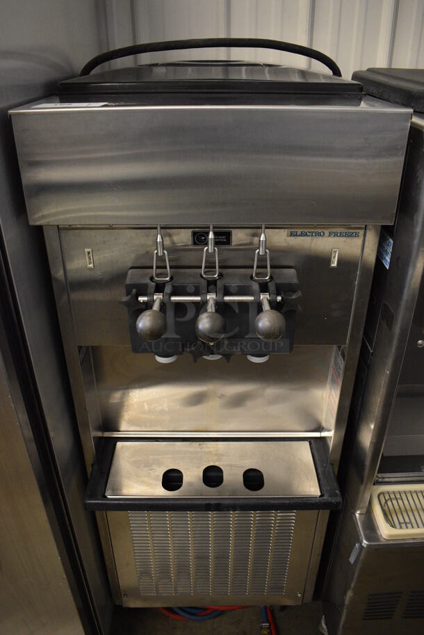 2013 Electro Freeze SL500-132 Stainless Steel Commercial Floor Style Water Cooled 2 Flavor w/ Twist Soft Serve Ice Cream Machine on Commercial Casters. 208-230 Volts, 1 Phase. 22x32x60