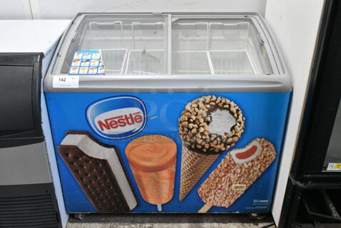 AHT RIO S Metal Commercial Chest Freezer Merchandiser on Commercial Casters. 115 Volts, 1 Phase. Tested and Working!