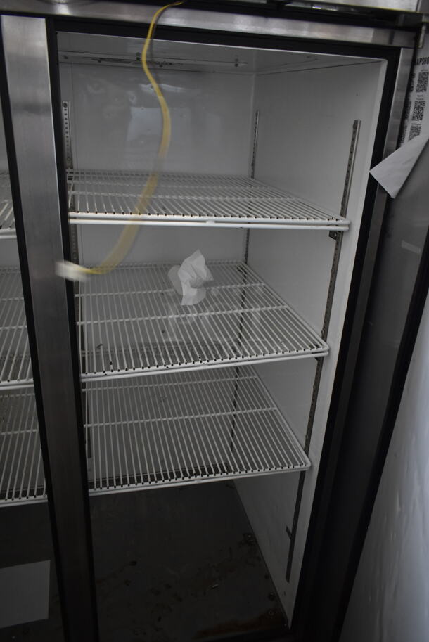 2014 True TG2R-2S ENERGY STAR Stainless Steel Commercial 2 Door Reach In Cooler w/ Poly Coated Racks on Commercial Casters. Doors Need To Be Reattached. 115 Volts, 1 Phase. Tested and Powers On But Does Not Get Cold - Image 5 of 8