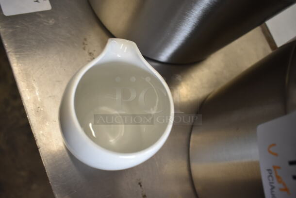 BRAND NEW! Lot of 4 Items; 2 Stainless Steel Cylindrical Drop In Bins, Metal Pan and Ceramic Pitcher. - Image 5 of 7