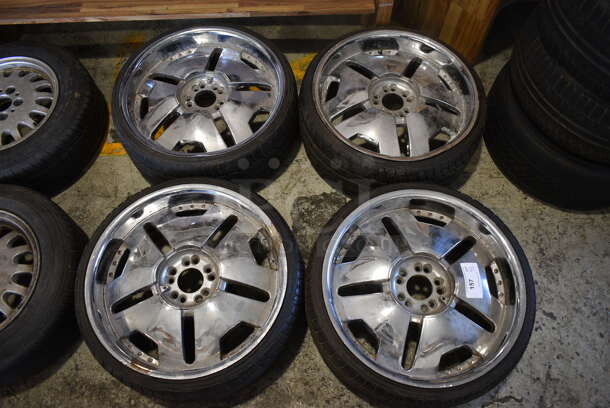 4 Various Tires on Rims Including 235/30 2R 20 88H. STW-160 20x8.5 JJ VW627A. Includes 25x10x25. 4 Times Your Bid!