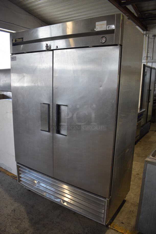 True Model T-49 Stainless Steel Commercial 2 Door Reach In Cooler w/ Poly Coated Shelves on Commercial Casters. 115 Volts, 1 Phase. 54x30x83. Tested and Working! - Image 2 of 6