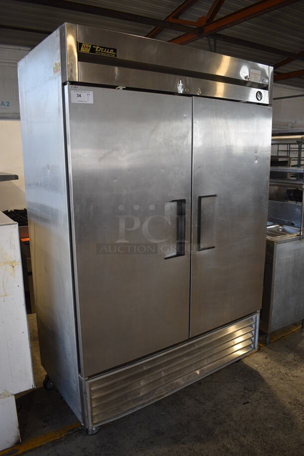 True Model T-49 Stainless Steel Commercial 2 Door Reach In Cooler w/ Poly Coated Shelves on Commercial Casters. 115 Volts, 1 Phase. 54x30x83. Tested and Working! - Image 3 of 6