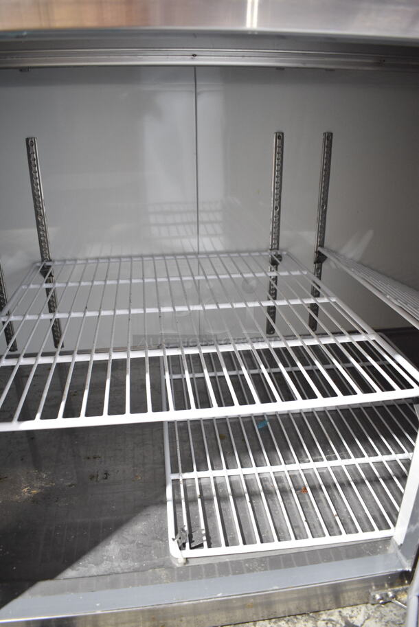 BRAND NEW SCRATCH AND DENT! 2023 Avantco 178APPT91HC Stainless Steel Commercial Pizza Prep Table. Comes w/ Commercial Casters. 115 Volts, 1 Phase. Tested and Does Not Power On - Image 7 of 9