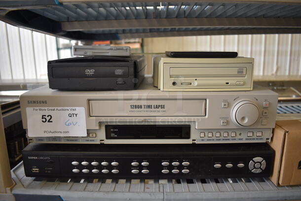 6 Various Items; Super Circuits, Samsung 1280H Time Lapse, iOmega DVD, Disc Player. Includes 17x13x2.5. 6 Times Your Bid!
