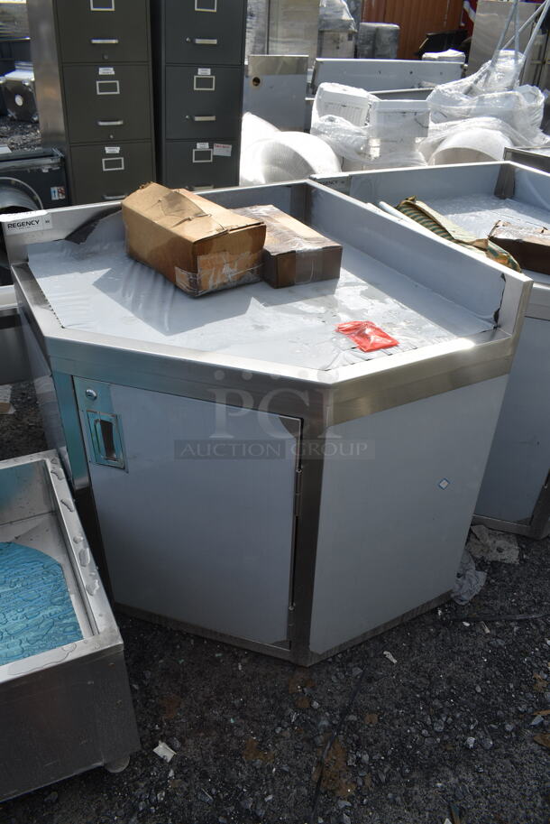 BRAND NEW SCRATCH AND DENT! Regency Spec Line Stainless Steel Commercial 30" x 30" 14 Gauge Stainless Steel Corner Work Table with Hinged Door and Lock - Image 2 of 7