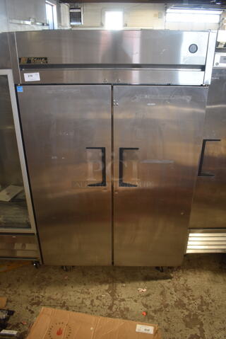2013 True TG2R-2S ENERGY STAR Stainless Steel Commercial 2 Door Reach In Cooler w/ Poly Coated Racks on Commercial Casters. 115 Volts, 1 Phase. Tested and Working!