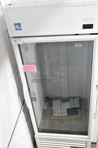 2021 True TSCI-600R-G-PH Metal Commercial Single Door Reach In Cooler Merchandiser. 115 Volts, 1 Phase. Tested and Working!