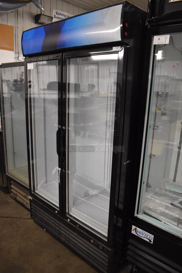 BRAND NEW SCRATCH AND DENT! KoolMore MDR-2GD-35C Metal Commercial 2 Door Reach In Cooler Merchandiser w/ Poly Coated Racks on Commercial Casters. 115 Volts, 1 Phase. 45x29x80. Tested and Working! - Image 1 of 5