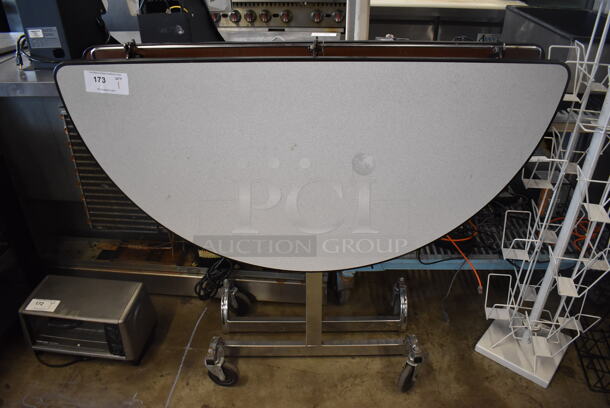 Gray Folding Portable Round Table on Commercial Casters. 47x18x40