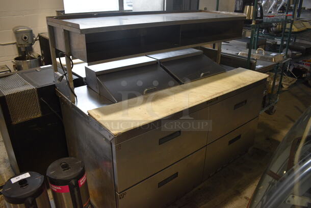 Delfield Stainless Steel Commercial Sandwich Salad Prep Table Bain Marie Mega Top w/ Cutting Board, Over Shelf and 4 Drawers on Commercial Casters. 115 Volts, 1 Phase. 65x33x55. Tested and Powers On But Temps at 49 Degrees