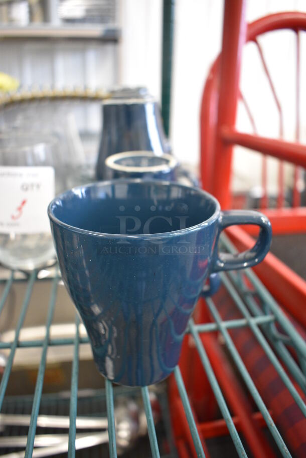8 Blue Ceramic Mugs. 4.5x3.5x4. 8 MRCTB