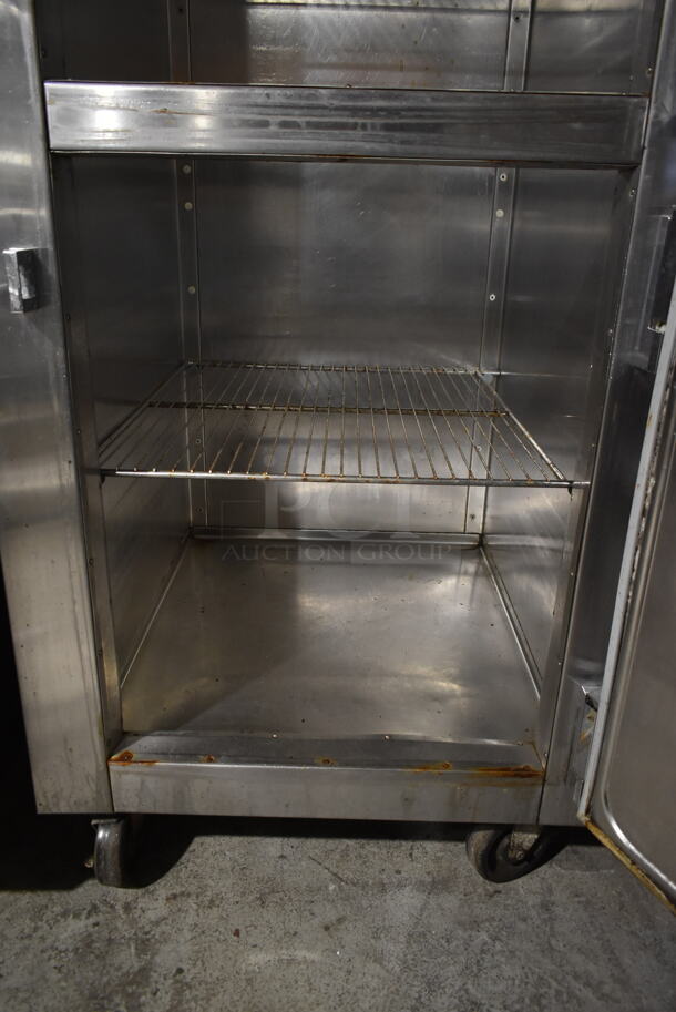 Traulsen RHT 1-32WUT Stainless Steel Commercial 2 Half Size Door Reach In Cooler w/ Racks on Commercial Casters. 115 Volts, 1 Phase. Tested and Powers On But Does Not Get Cold - Image 7 of 7