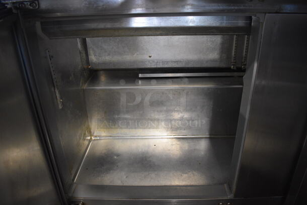 Continental Model SW60-24M Stainless Steel Commercial Sandwich Salad Prep Table Bain Marie Mega Top Bain Marie w/ 2 Over Shelves on Commercial Casters. 115 Volts, 1 Phase. 60x36x72. Tested and Working! - Image 9 of 10