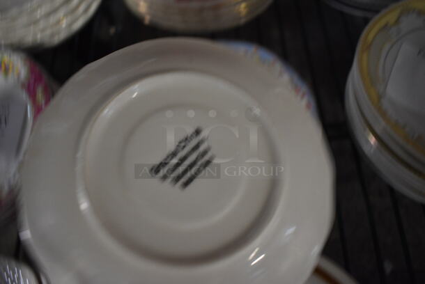 4 White Ceramic Saucers w/ Blue Rim and Floral Pattern. 6x6x1. 4 Times Your Bid! - Image 3 of 3