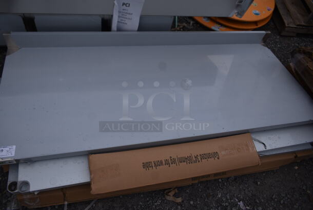 BRAND NEW SCRATCH AND DENT! Regency 600TB3072G 30" x 72" 18-Gauge 304 Stainless Steel Commercial Work Table with 4" Backsplash and Galvanized Undershelf - Image 3 of 6