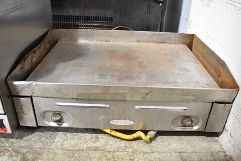 Star Stainless Steel Commercial Countertop Natural Gas Powered Flat Top Griddle.