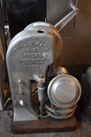 Dial O Matic D-301 Metal Commercial Countertop Pie Crust Press. 115 Volts, 1 Phase. 21x21x37. Tested and Does Not Power On