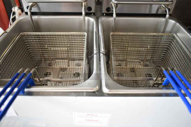 BRAND NEW SCRATCH AND DENT! 2023 Globe PF32E Stainless Steel 32 lb. Dual Tank Electric Countertop Fryer w/ 2 Metal Fry Baskets. 208/240 Volts, 1 Phase.  - Image 4 of 6