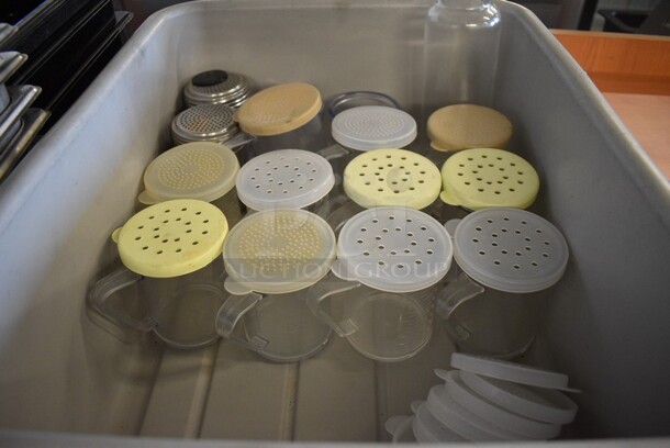 ALL ONE MONEY! Lot of Various Poly and Metal Shakers, Replacement Lids and Poly Oil Container in Gray Poly Bus Bin. Includes 4x3x4. - Image 2 of 5
