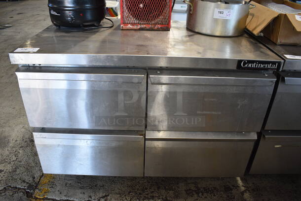 Continental Model SWF48 Stainless Steel Commercial Undercounter 4 Drawer Freezer on Commercial Casters. 115 Volts, 1 Phase. 48x30x34. Tested and Does Not Power On