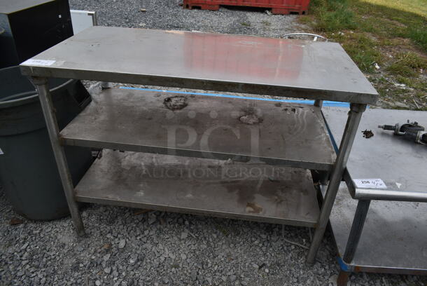 Stainless Steel Commercial Table w/ 2 Metal Under Shelves. 