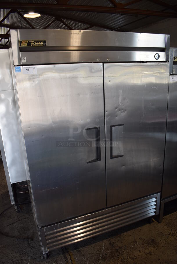 2013 True T-49F ENERGY STAR Stainless Steel Commercial 2 Door Reach In Freezer w/ Poly Coated Racks on Commercial Casters. 115 Volts, 1 Phase. Tested and Working! - Image 1 of 5