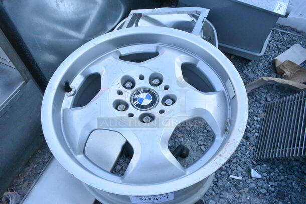 BMW Rim on Stand w/ Casters. Was Used as a Table w/ Glass Pane on Top That Does Not Come w/ The Unit - Image 2 of 2