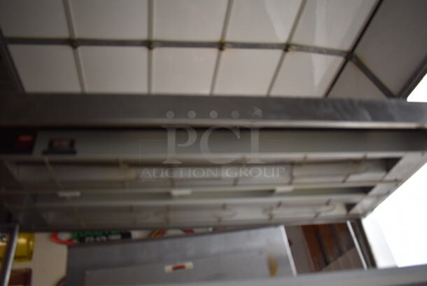 Stainless Steel Commercial Table w/ 3 Over Shelves, 3 Warming Strips, 2 Doors and Under Shelf. 48x30x82 - Image 8 of 12