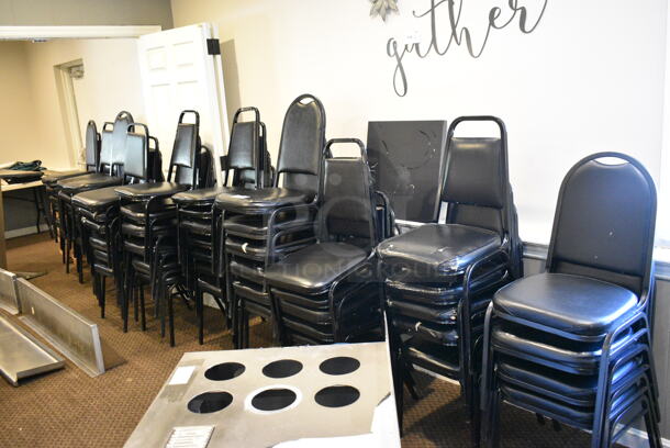 55 Assorted Black Metal Stackable Banquet Chair. 55 Times Your Bid! BUYER MUST REMOVE: Bring Tools and Manpower Needed To Remove This Item. (secondary dining room) - Image 1 of 4