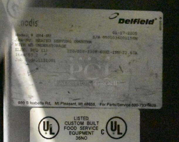 Delfield SH4-NU Stainless Steel Commercial Electric Powered 4 Bay Steam Table w/ Sneeze Guard on Commercial Casters. 120/208-240 Volts, 1 Phase.  - Image 9 of 10
